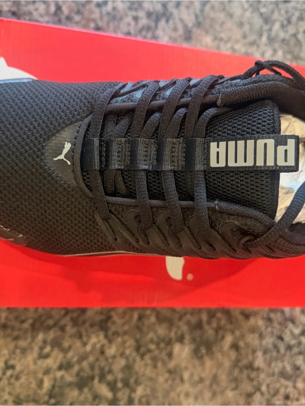 Puma Kids Black Sneaker with Silver Stripe Accents